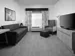 King Suite Living Area with Lounge Area and Room Technology