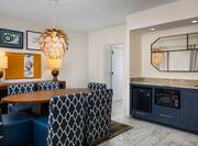presidential suite wet bar and dining area