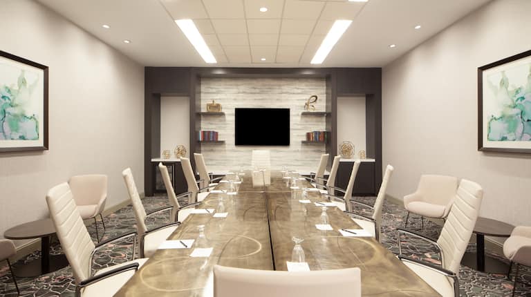Boardroom with tables and chairs