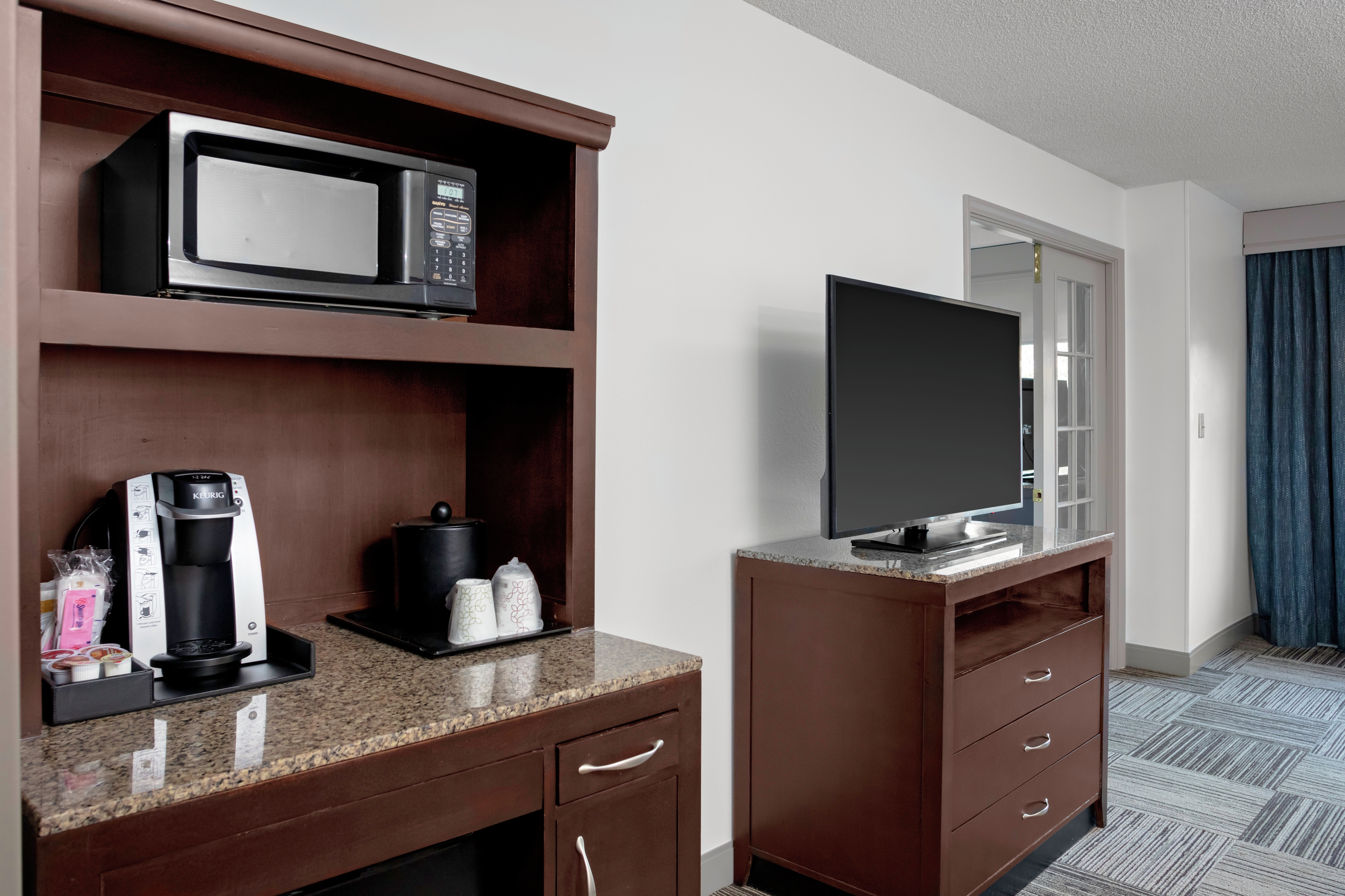 Microwave and Coffeemaker in Guest Room with HDTV