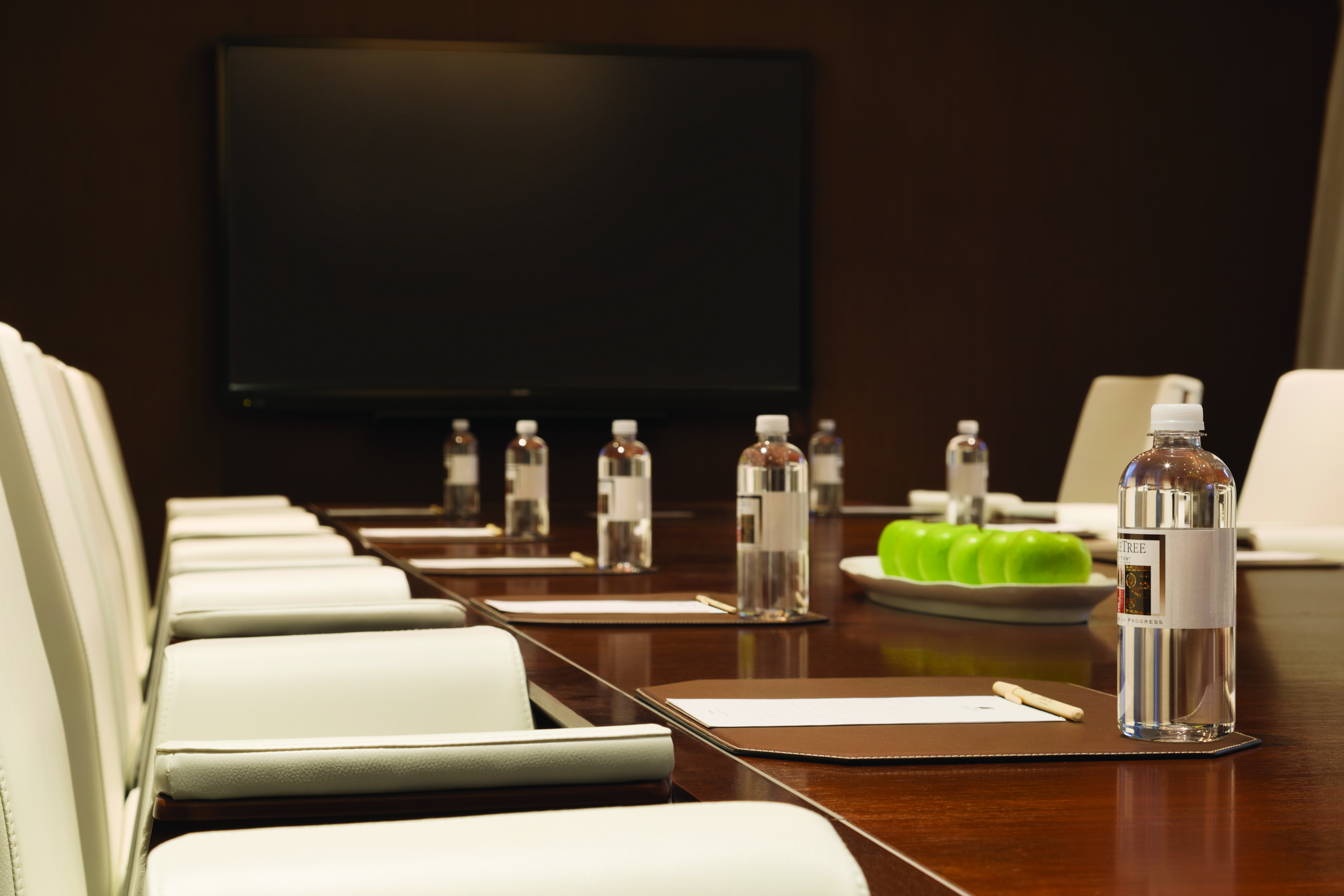 Close up View of Boardroom Table with Water