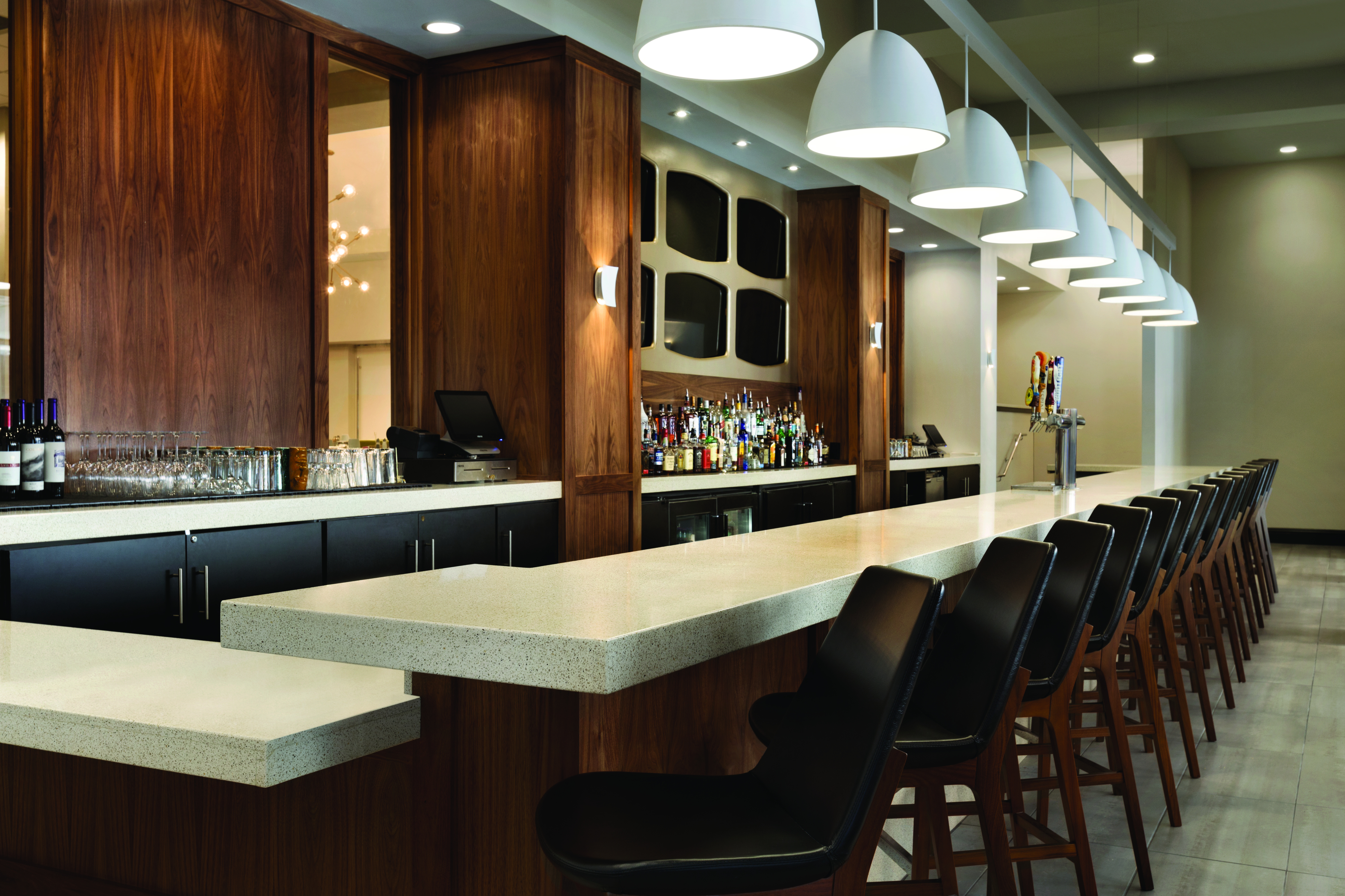 Angled View of the Bar, Chairs, and Service Area of The Cloakroom Bar