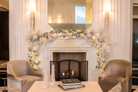 lobby fireplace with holiday decorations