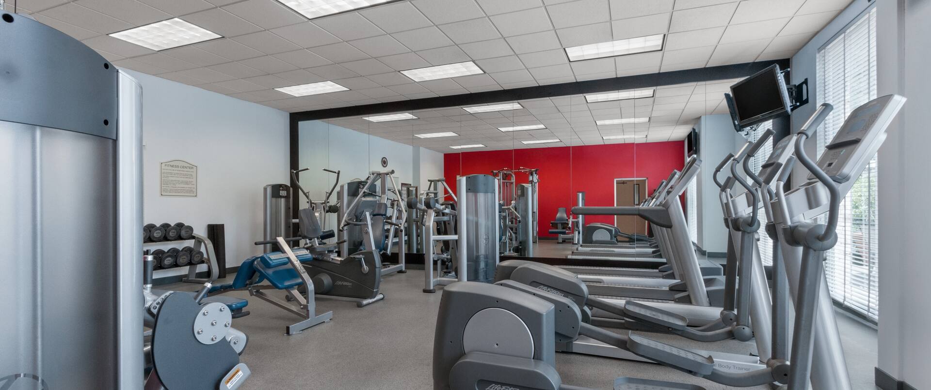 Fitness Center with ellipticals and other equipment.