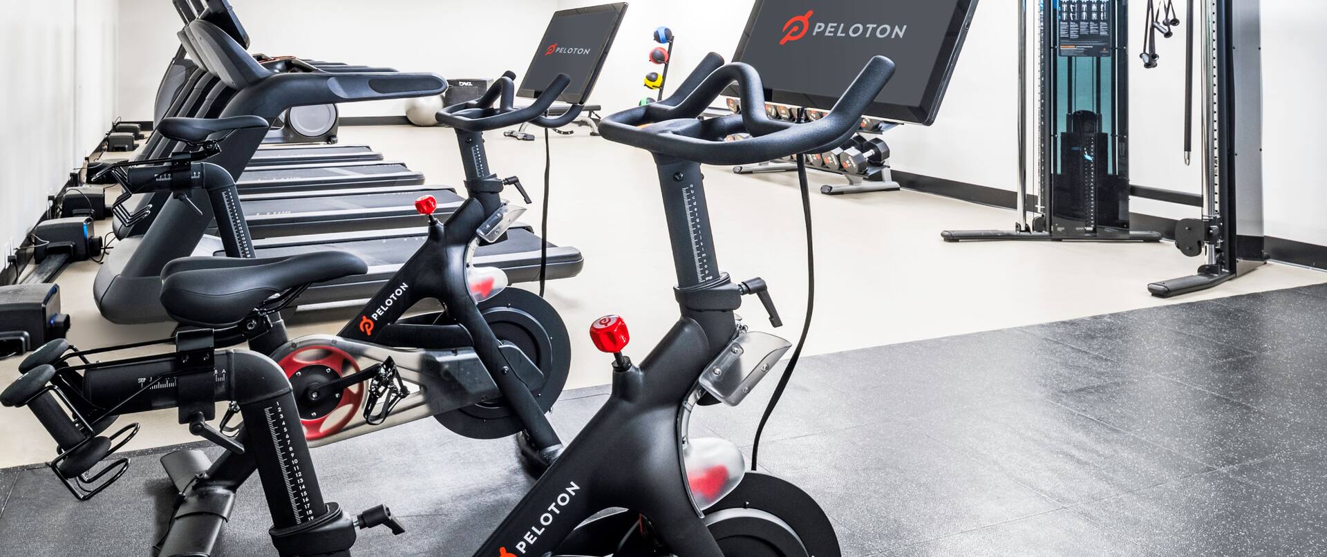 fitness center with peloton bikes