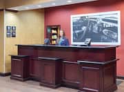 Front Desk Reception Area with Attendant