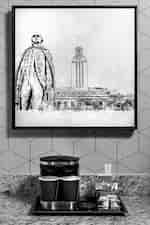 Close up image of tea/coffee station with painting 