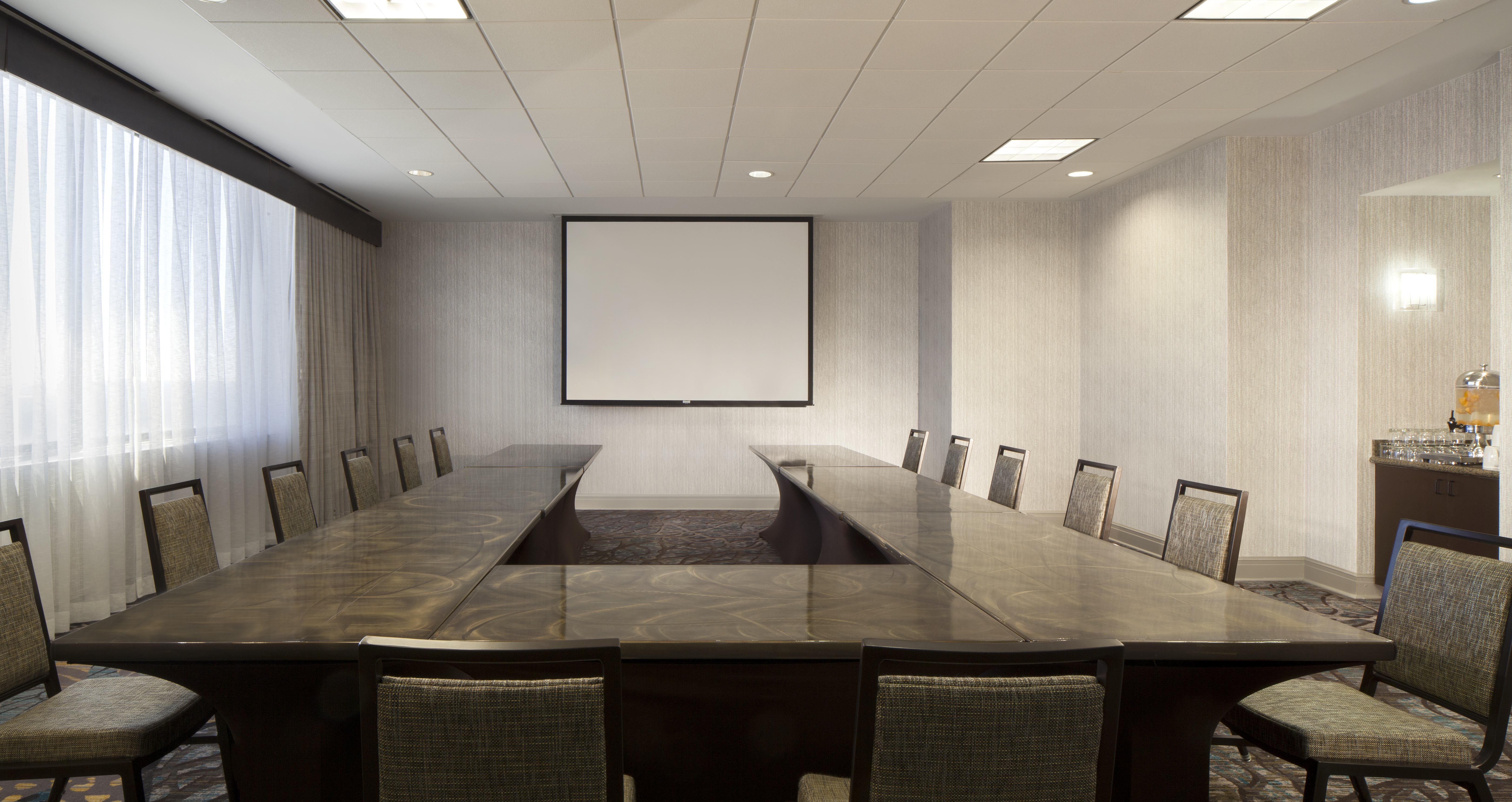 Meeting Room U-Shape Table Layout with Projector Screen