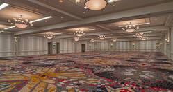 View of Phoenix Ballroom With Colorful Carpeting an Decorative Lighting