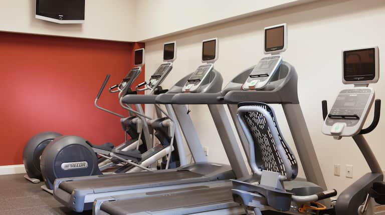 Fitness Center With TV and Cardio Machines