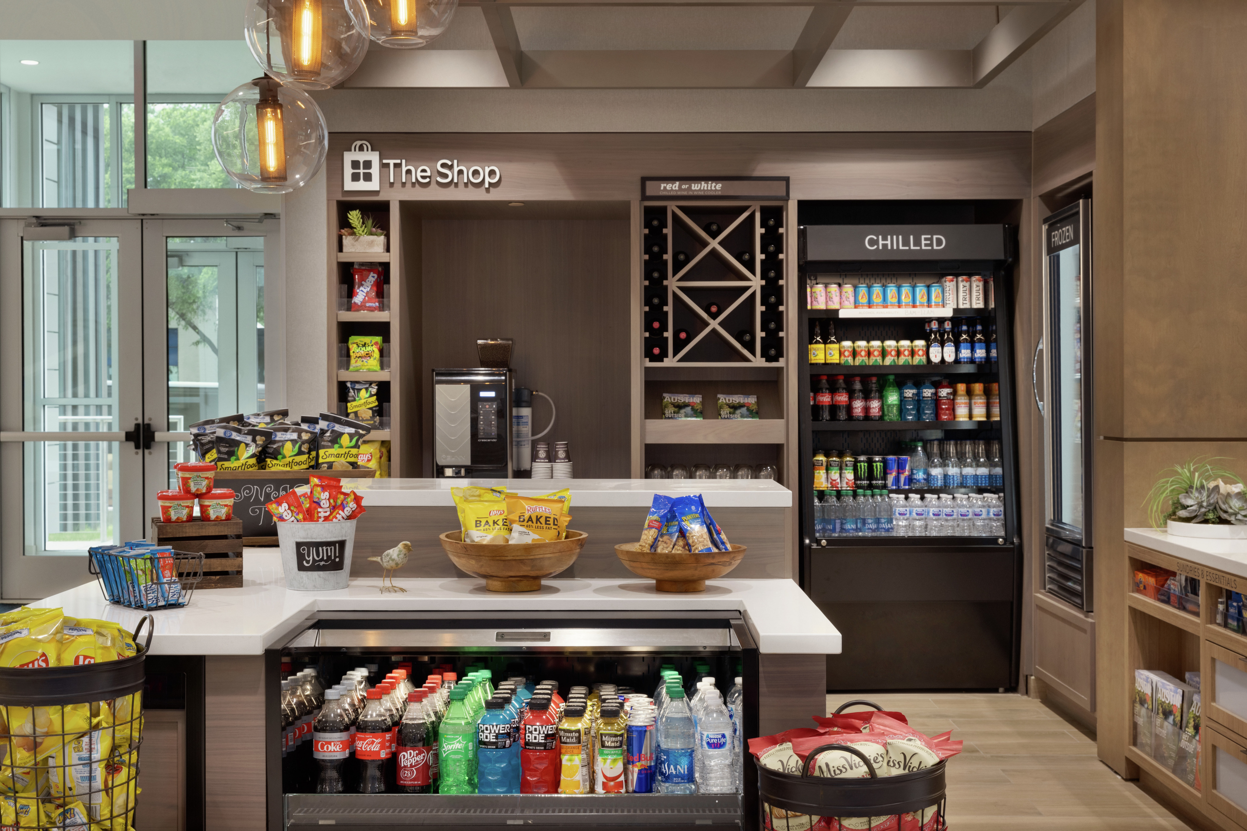 Convenient on-site shop fully stocked with cold beverages, coffee, and snacks.