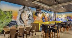 Wonderful on-site restaurant and bar featuring eye-catching mural.