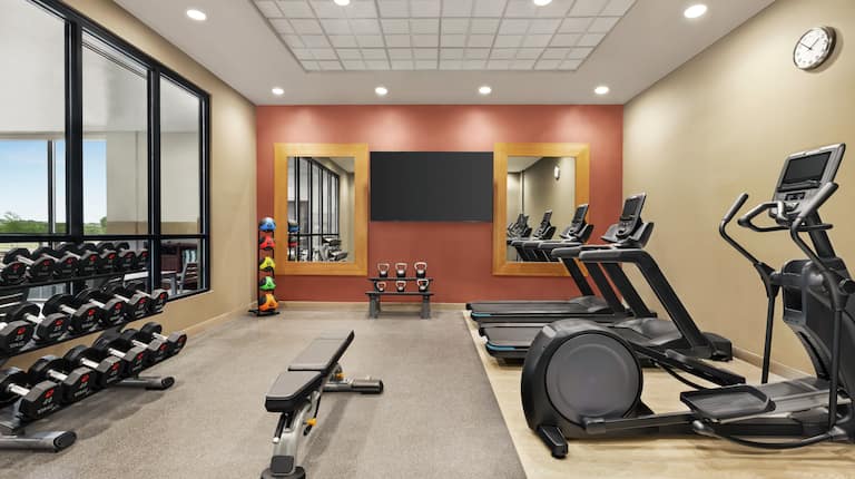 Convenient on-site fitness center fully equipped with cardio machines and free weights.