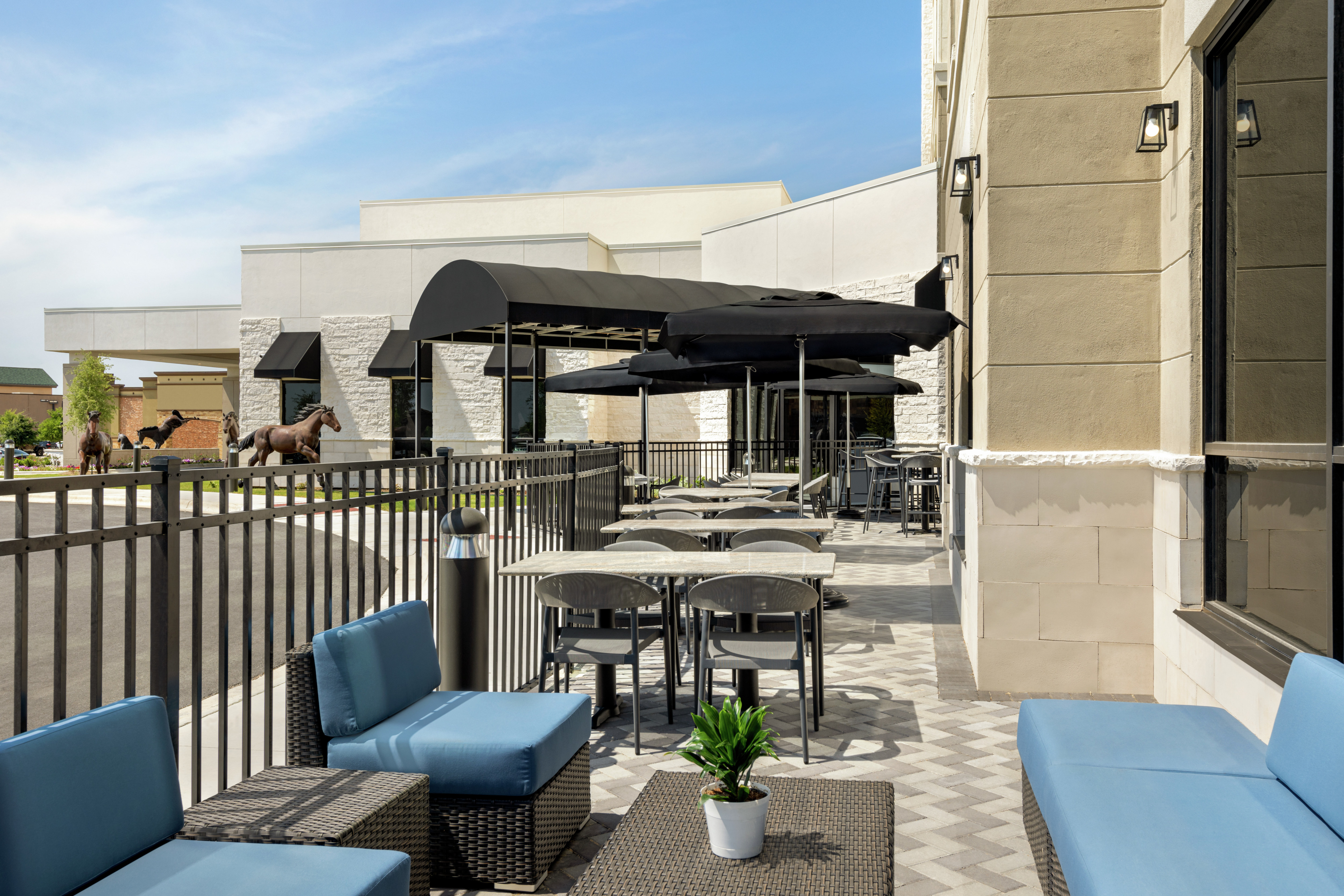 Spacious outdoor patio at on-site restaurant and bar.