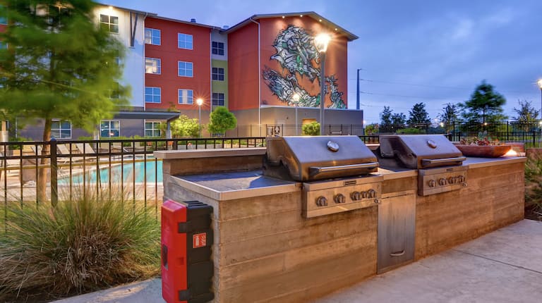Outdoor Patio with Grilling Stations near Pool