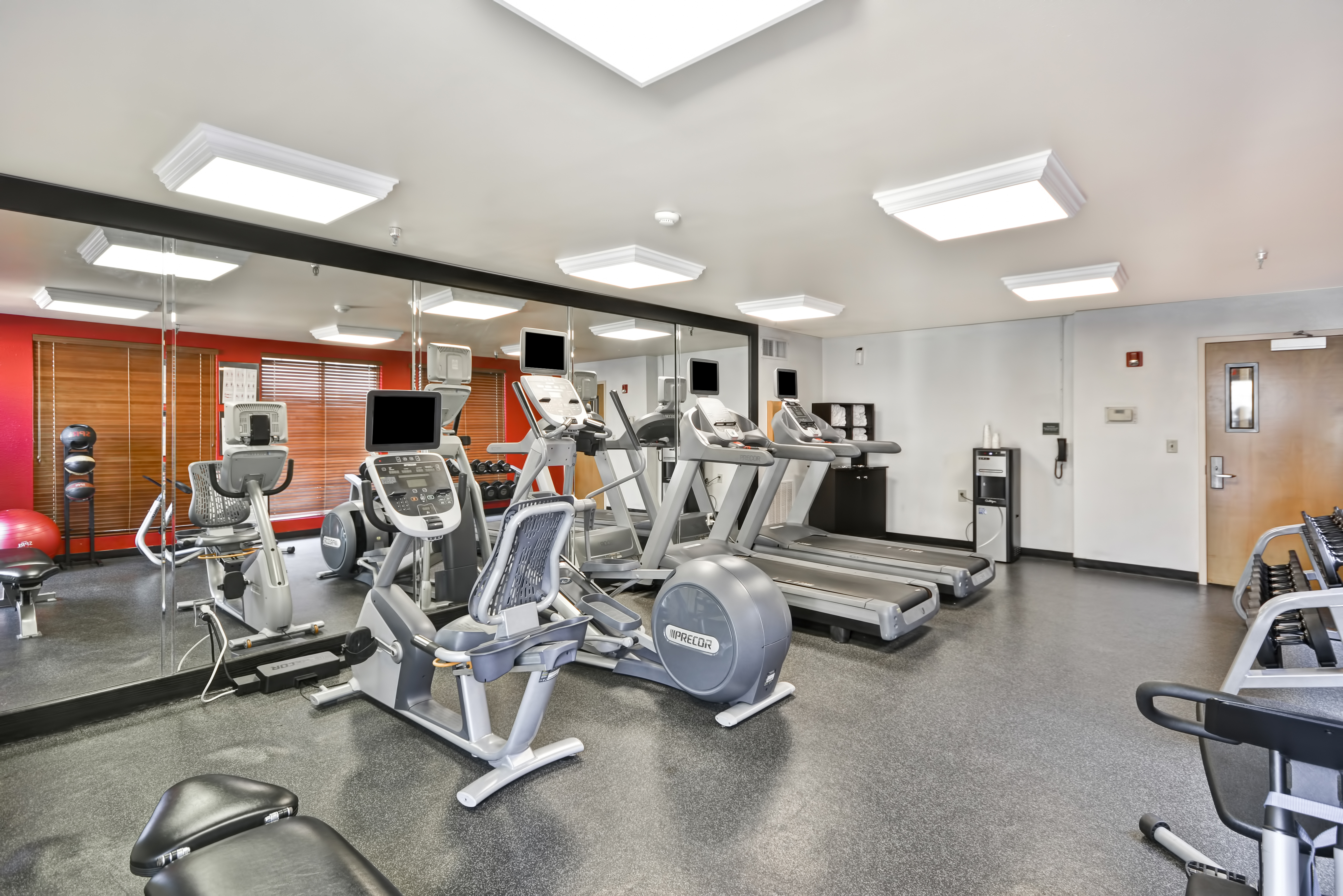 Fitness Center with treadmills, weights, and other equipment. 