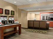 Front Desk Reception Area with Coffee Station