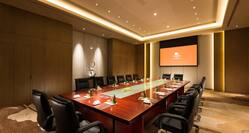Seating for 16 Around Large Table and Presentation Screen in Boardroom