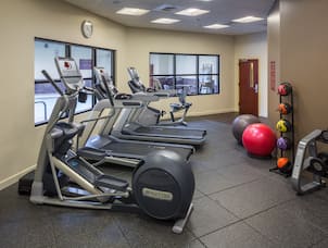  Fitness Center With Cardio Machines, Exercise Balls, Weight Balls, and Free Weights