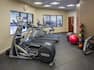  Fitness Center With Cardio Machines, Exercise Balls, Weight Balls, and Free Weights
