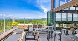 Montford rooftop bar outdoor seating with mountain views