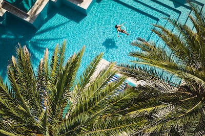 Overhead view of person in pool