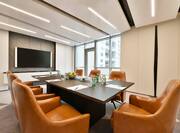 Boardroom with Seating for 7 Guests and an HDTV