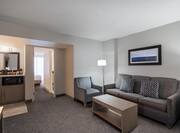 Enjoy our spacious suites, complete with cozy lounge area.