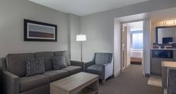 Our spacious rooms offer a wet bar and sitting area.