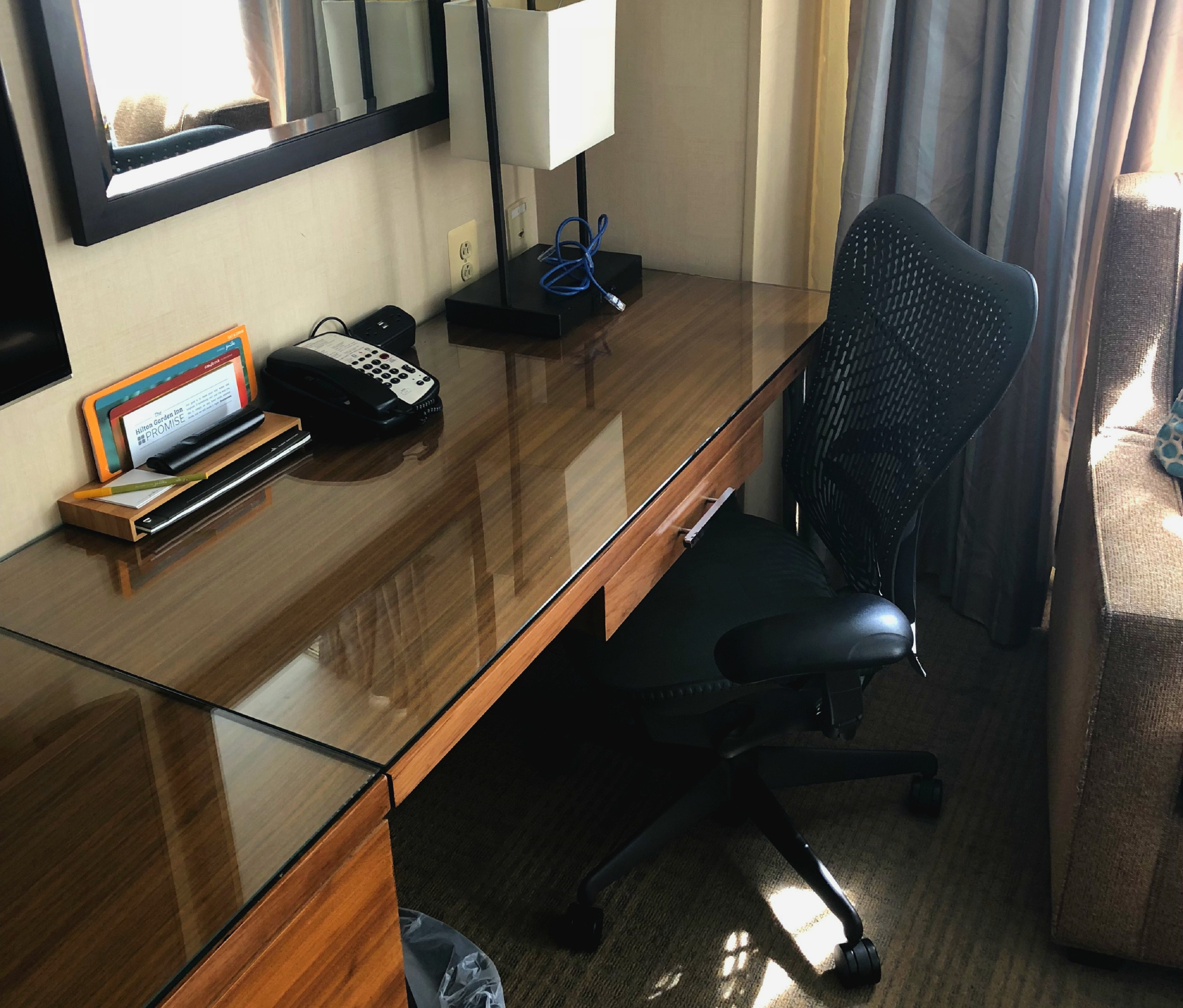work desk area with ergonomic chair