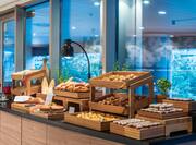 a Selection of Breads and Pastries in Breakfast Area