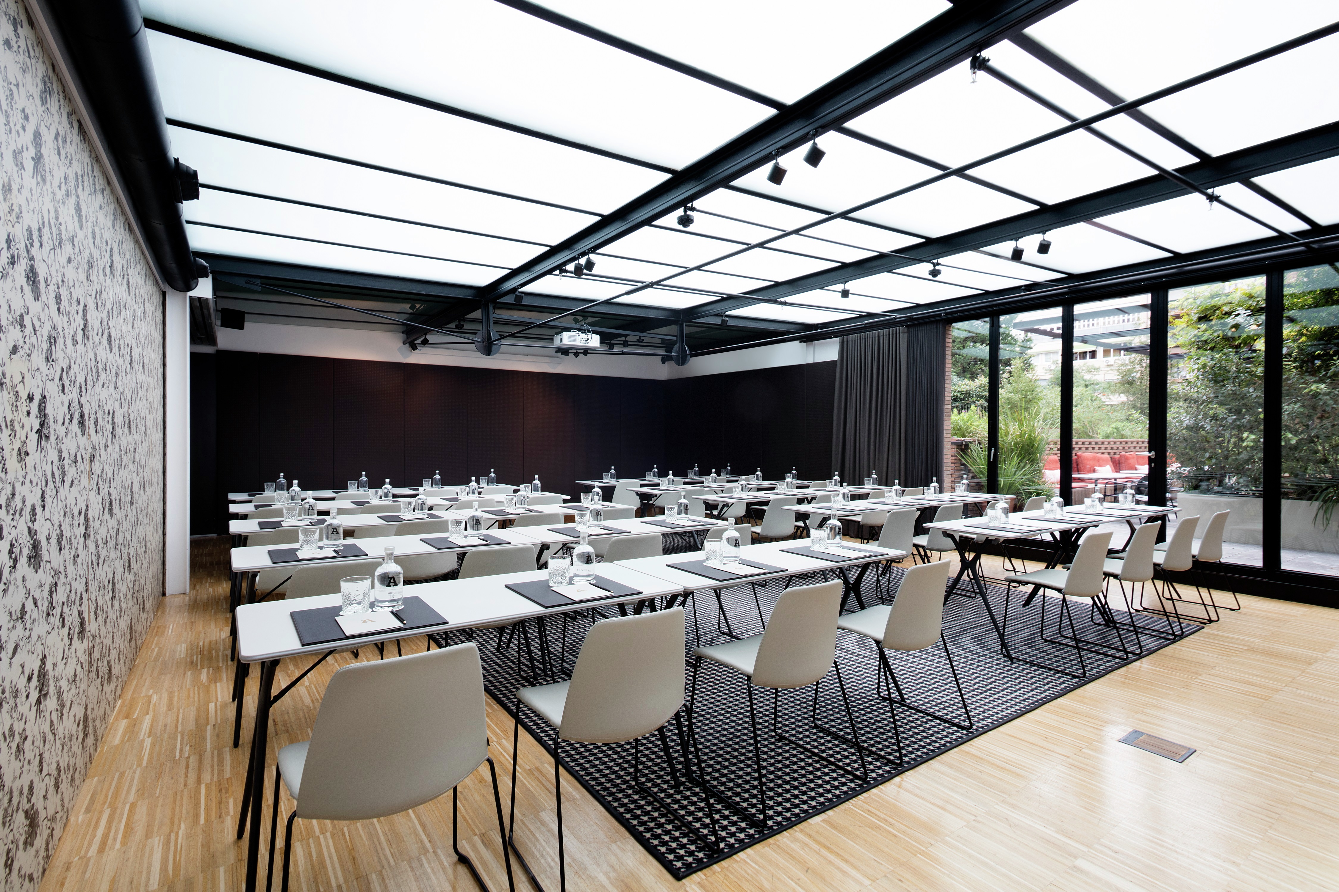 Alexandra Barcelona Curio Hotel Ballroom with Tables, Chairs, and Outside View