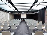 Alexandra Barcelona Curio Hotel Ballroom with Chairs and Projector Screen