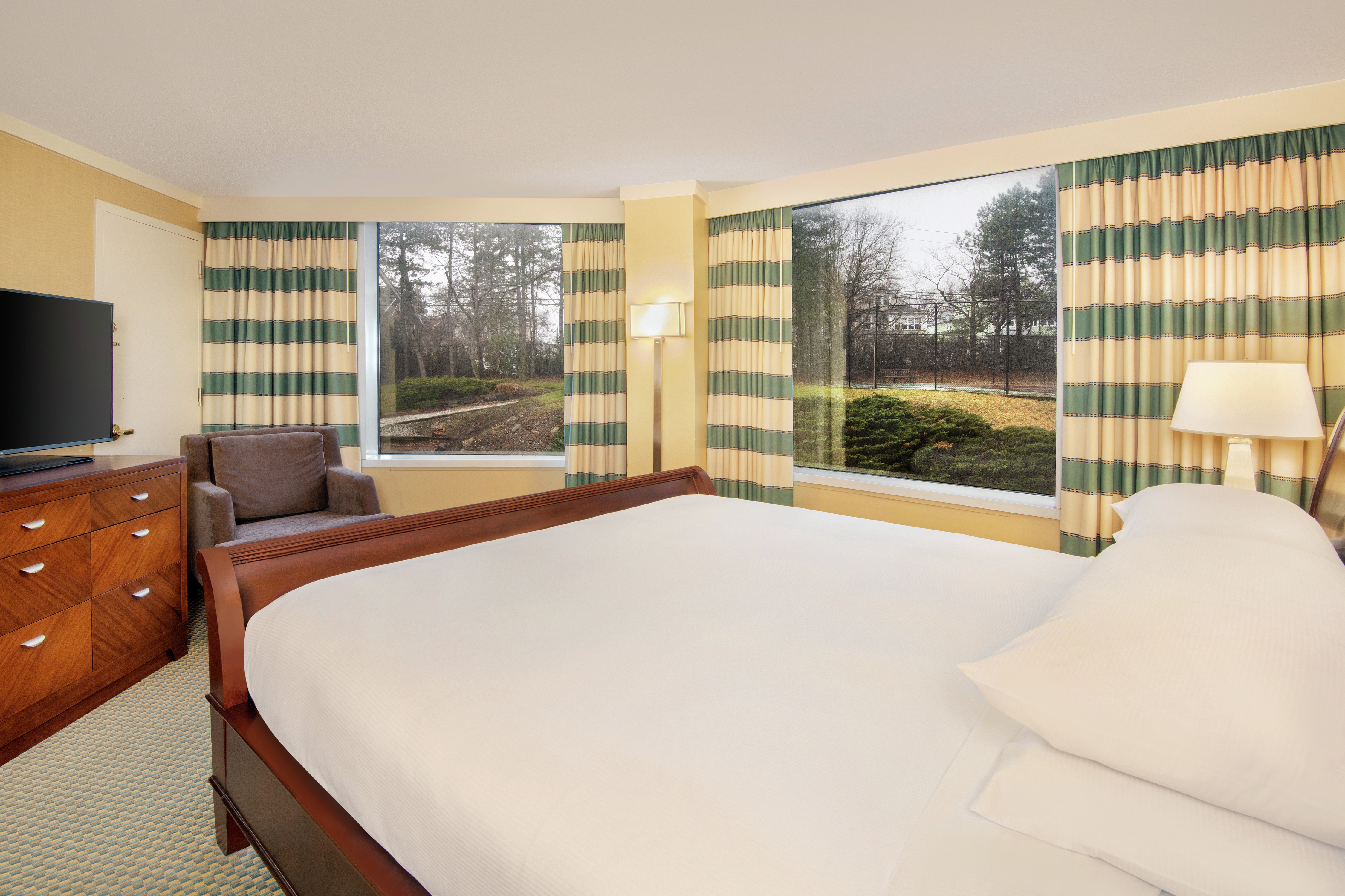 King Suite with Bed, Lounge Area, Outside View, and Room Technology