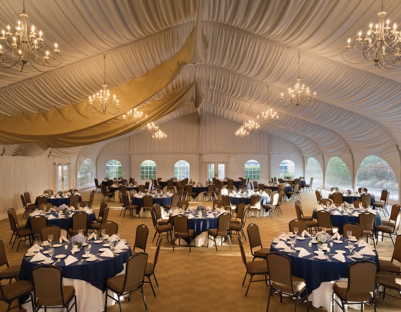 Pavilion with Round Tables and Chairs Setup for Event