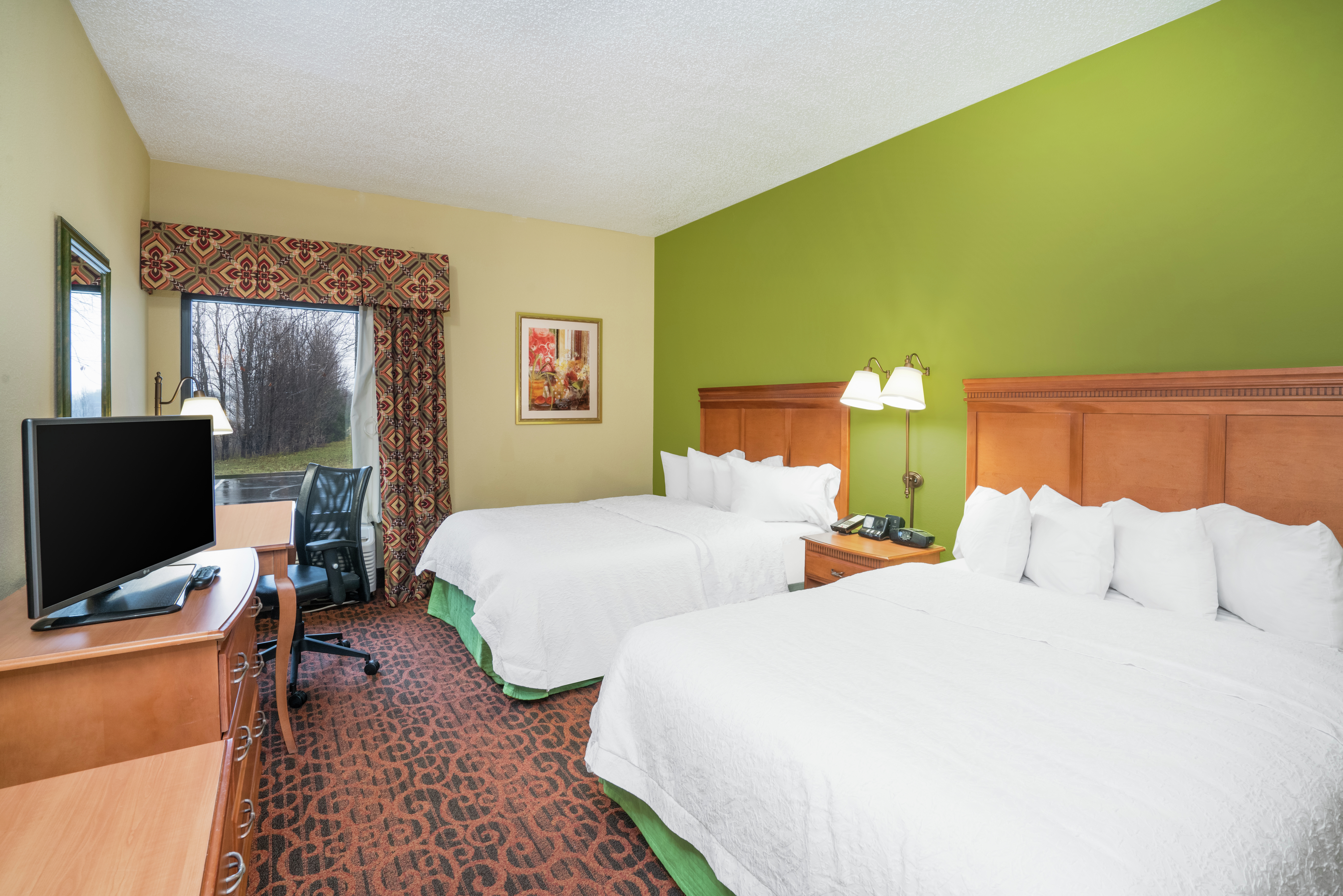 Mobility Accessible Guest Room with Two Queen Beds, Work Desk, Chair, TV, and Outside View