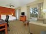 King Studio Suite with Bed, Lounge Area, Work Desk, Outside View, and Room Technology
