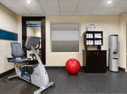 Fitness Center Cycle Machine, Gym Ball, Towel Shelf and Water Tower