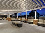 Outdoor patio at night with seating