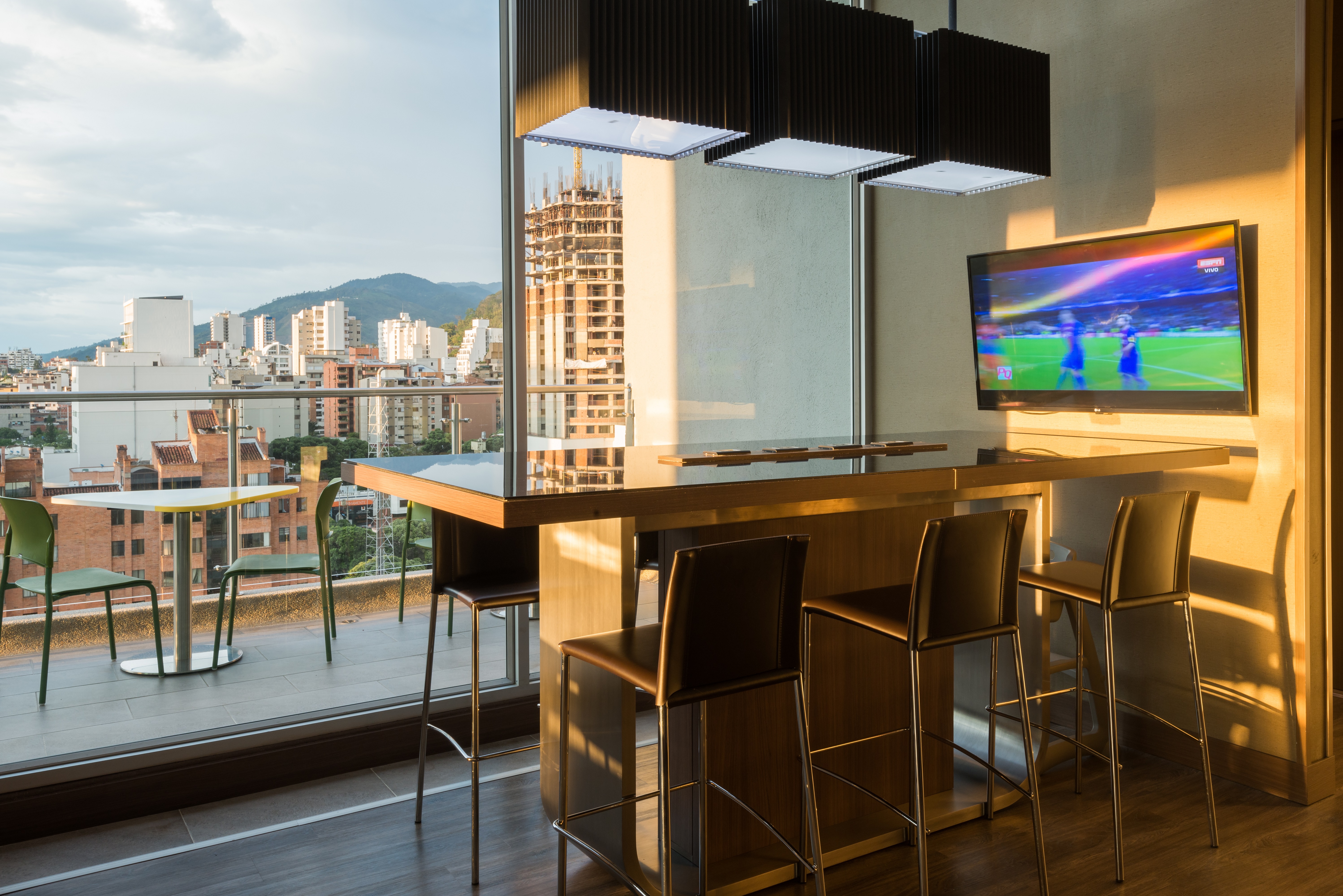 Outdoor Bar with TV and City View