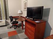 TV and workdesk in room