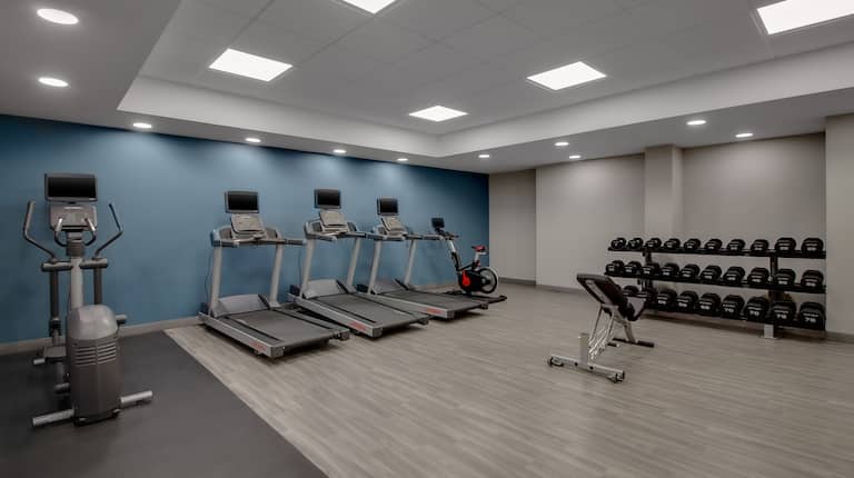 Fitness Center with Treadmills Weights and Elliptical Machine