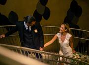 Wedding Couple Walking up Stairs