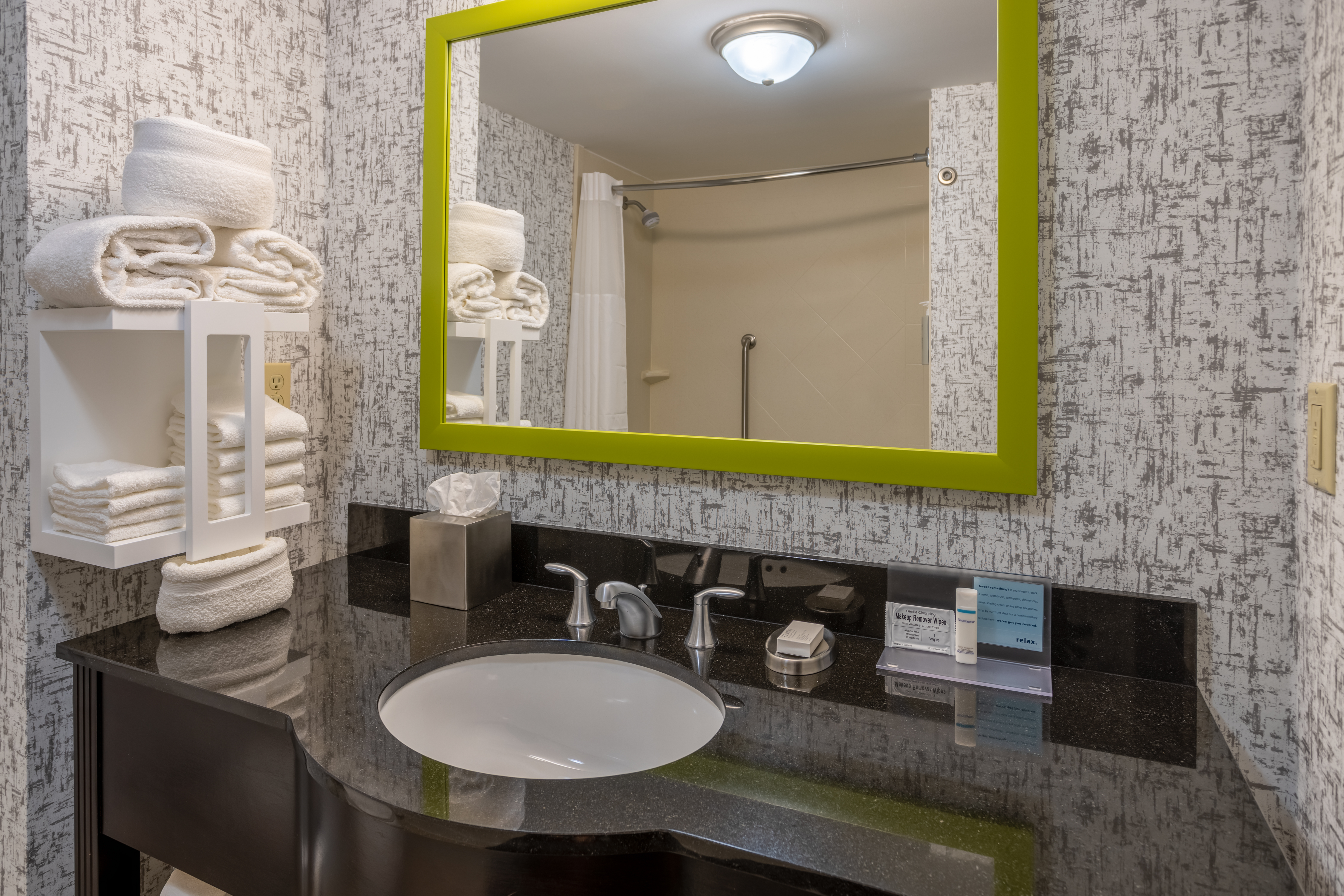 Guest bathrooms feature modern design