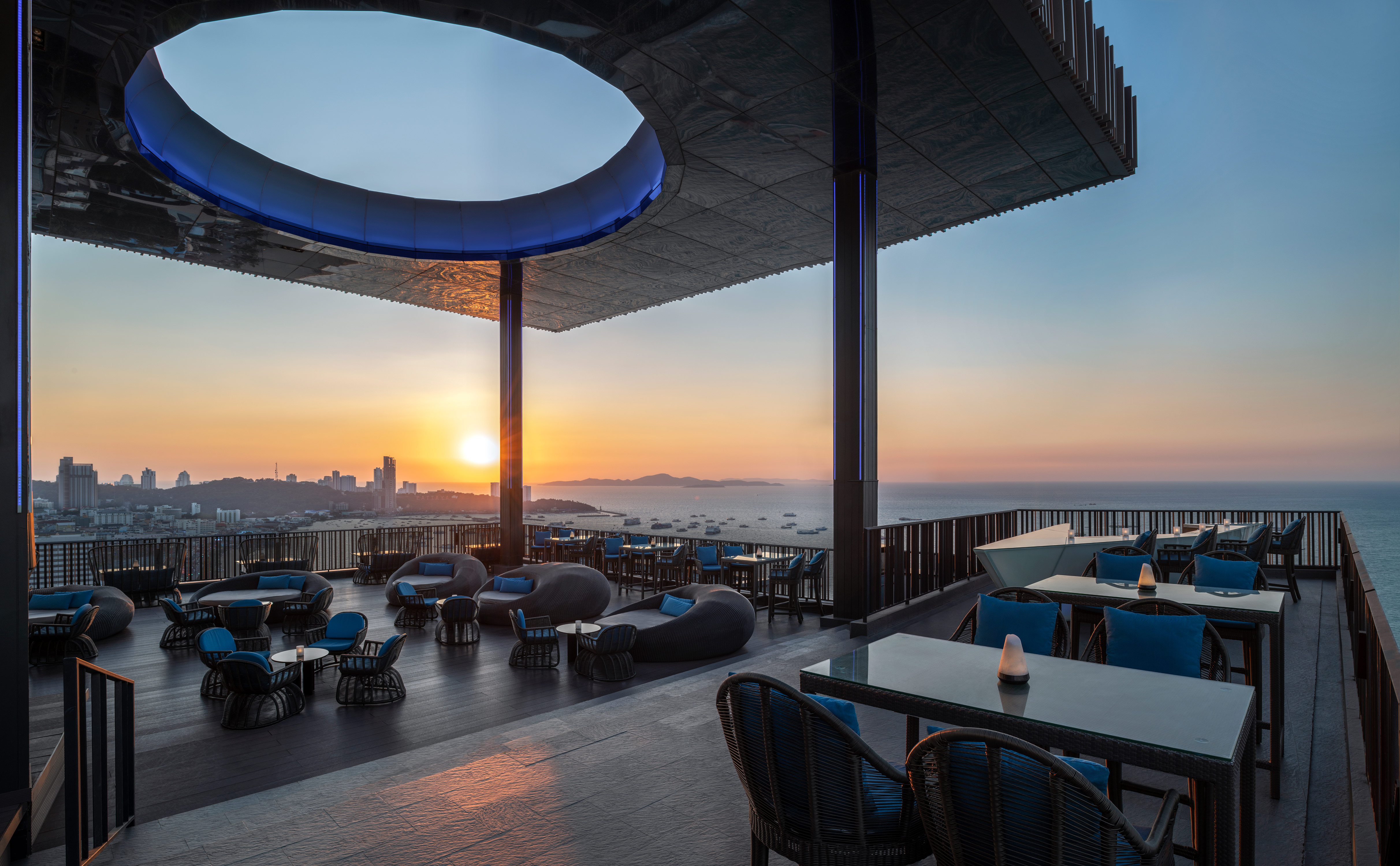 Terrace of Horizon Rooftop Bar with City View at Sunset