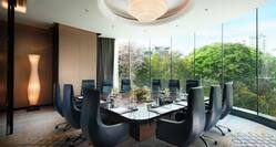 Executive Boardroom with Meeting Table and Office Chairs