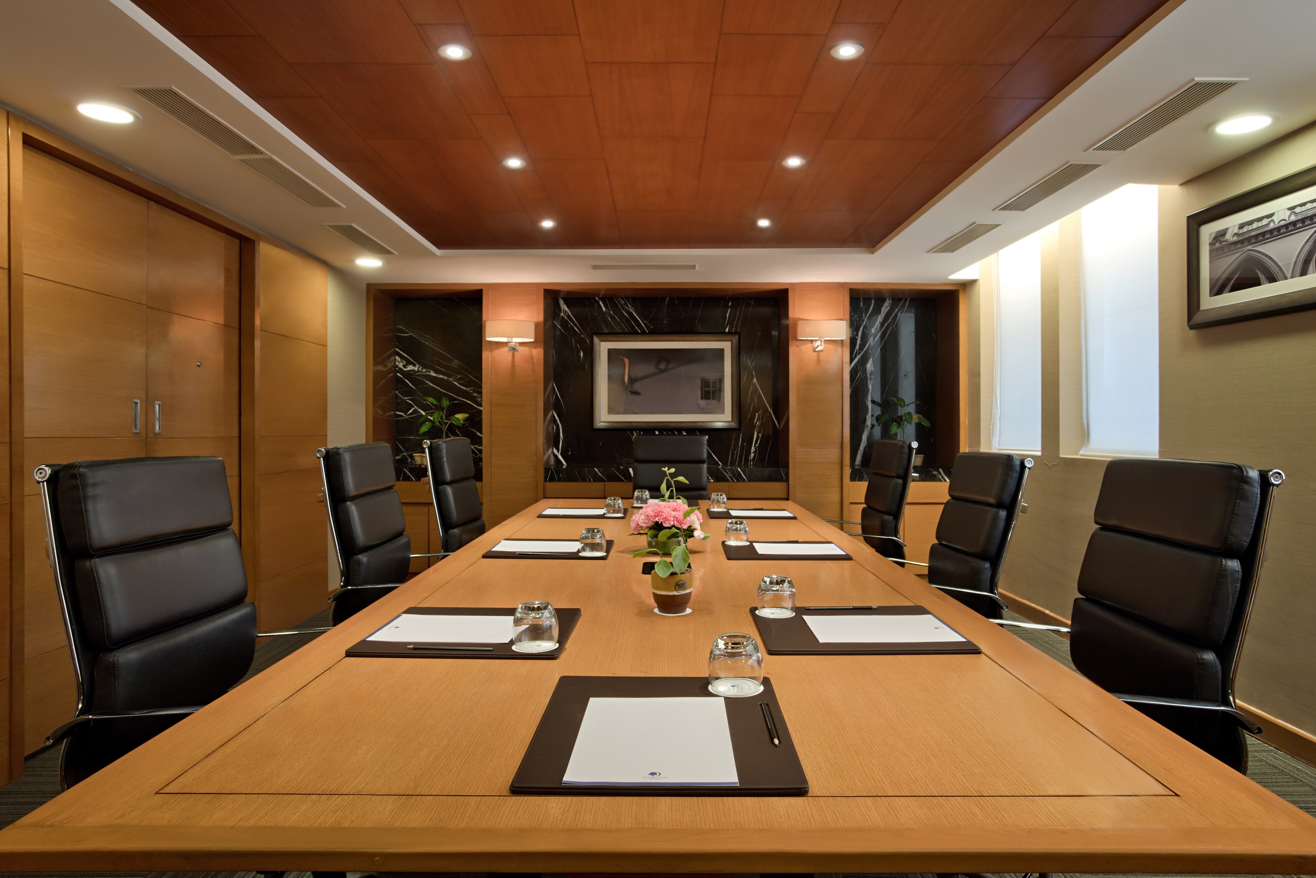 Boardroom area with tables and chairs