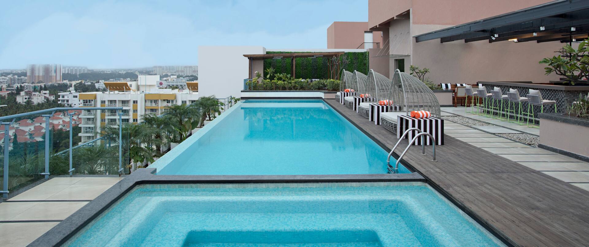 Outdoor pool with handrail