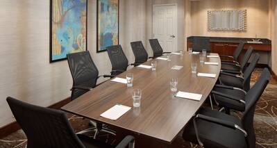 Boardroom Meeting Table, Office Chairs and Wet Bar