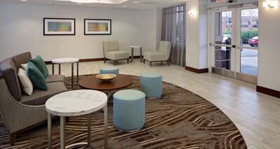 Lobby Seating Area with Sofa, Seats and Coffee Tables